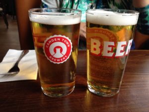 two glasses of beer on a table