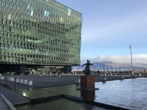 a building with a statue in front of it