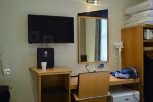 a desk and chair in a room