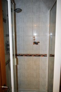 a shower with a glass door