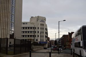 a white building with blue writing on it