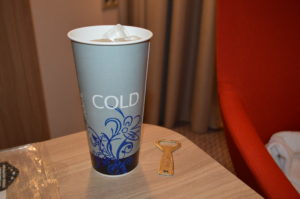 a cup of cold beverage on a table