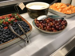 a group of bowls of fruit