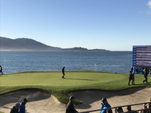 a group of people on a golf course