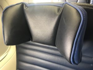 a black and blue seat with a blue cushion