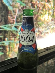 a bottle of beer on a table