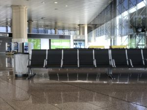 a row of black seats in a building