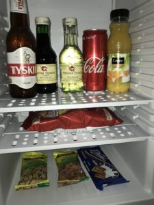 a refrigerator full of drinks and snacks