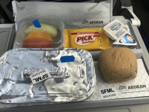 food in a tray on a plane