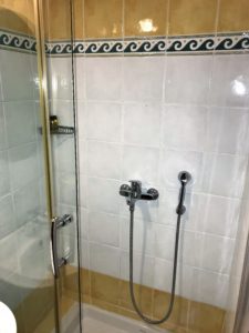 a shower with a glass door