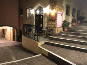 a building with stairs and a table