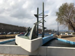 a sculpture in a fountain