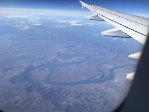 an airplane wing and a river