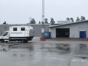 a truck parked in front of a building