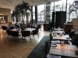 a restaurant with tables and chairs