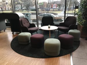 a group of chairs around a table