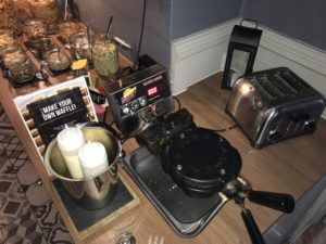 a waffle iron on a table