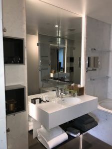 a bathroom with a mirror