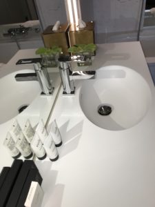 a bathroom sink with a mirror and a sink