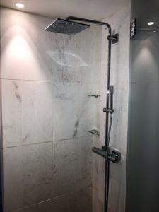 a shower with a shower head