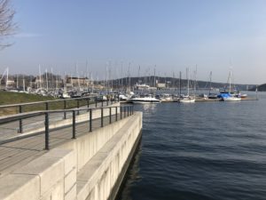 a dock with boats on the water