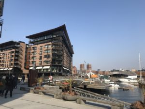 a building next to a body of water