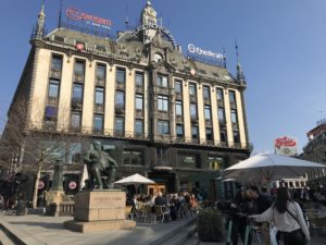 a building with a statue in front of it