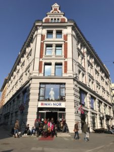 a group of people outside of a building