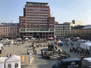 a large building with people in the background