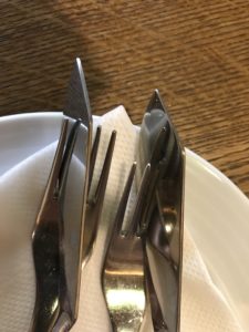 a close up of a fork and knife