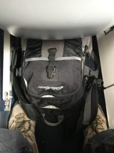 a backpack on a plane