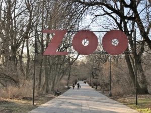 a sign over a walkway