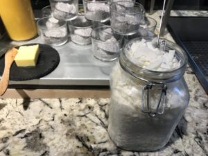 a jar of white powder on a counter