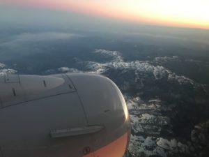 an airplane wing and the sky