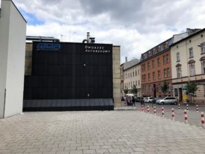 a building with a black wall