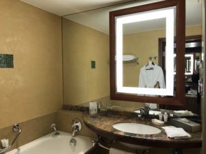 a bathroom with a mirror