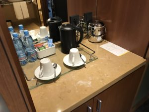 a coffee cups and saucers on a counter