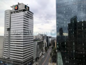 a city street with tall buildings