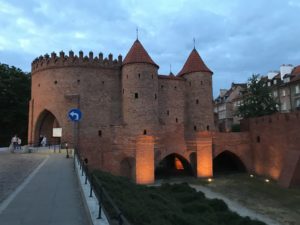 a brick building with a gate