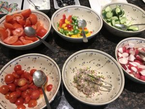 a group of bowls of food