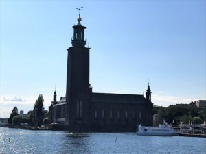 Stockholm City Hall with a tower on the water
