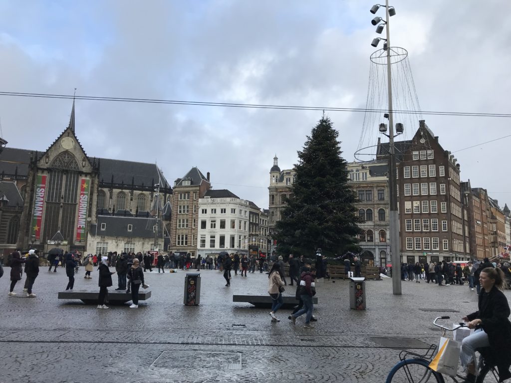 a group of people in a plaza