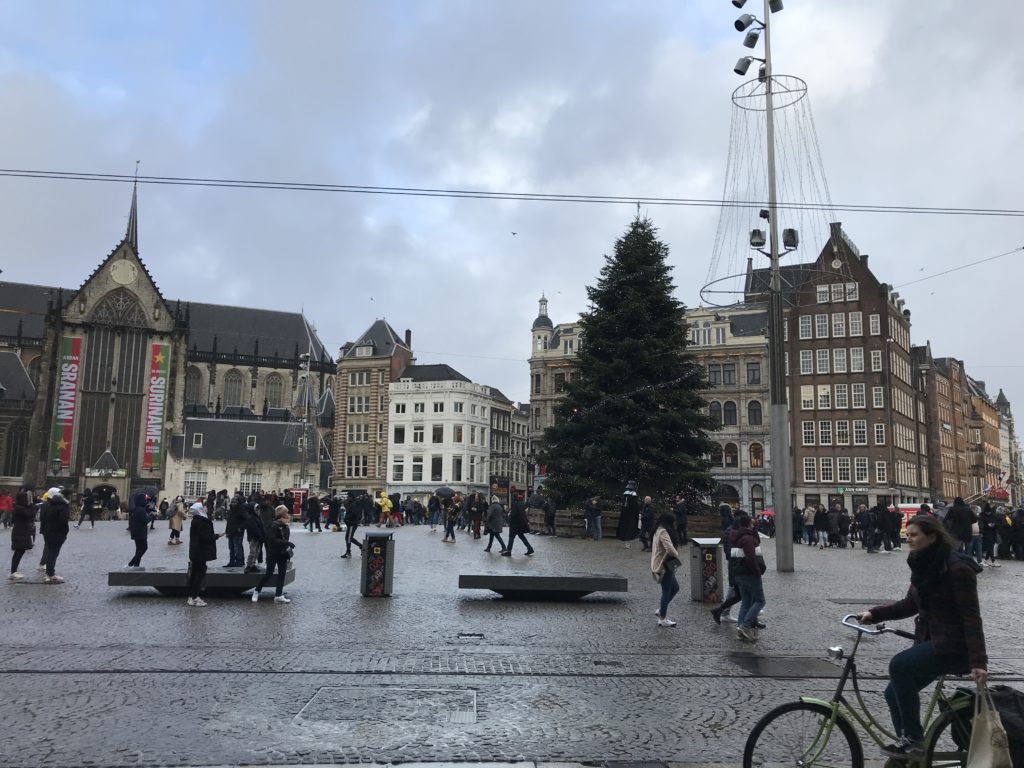 a group of people in a plaza