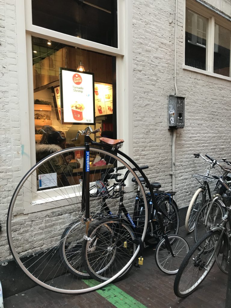 a bicycle parked outside a building