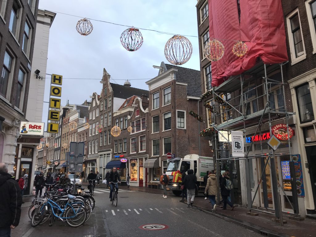 a street with buildings and people on it