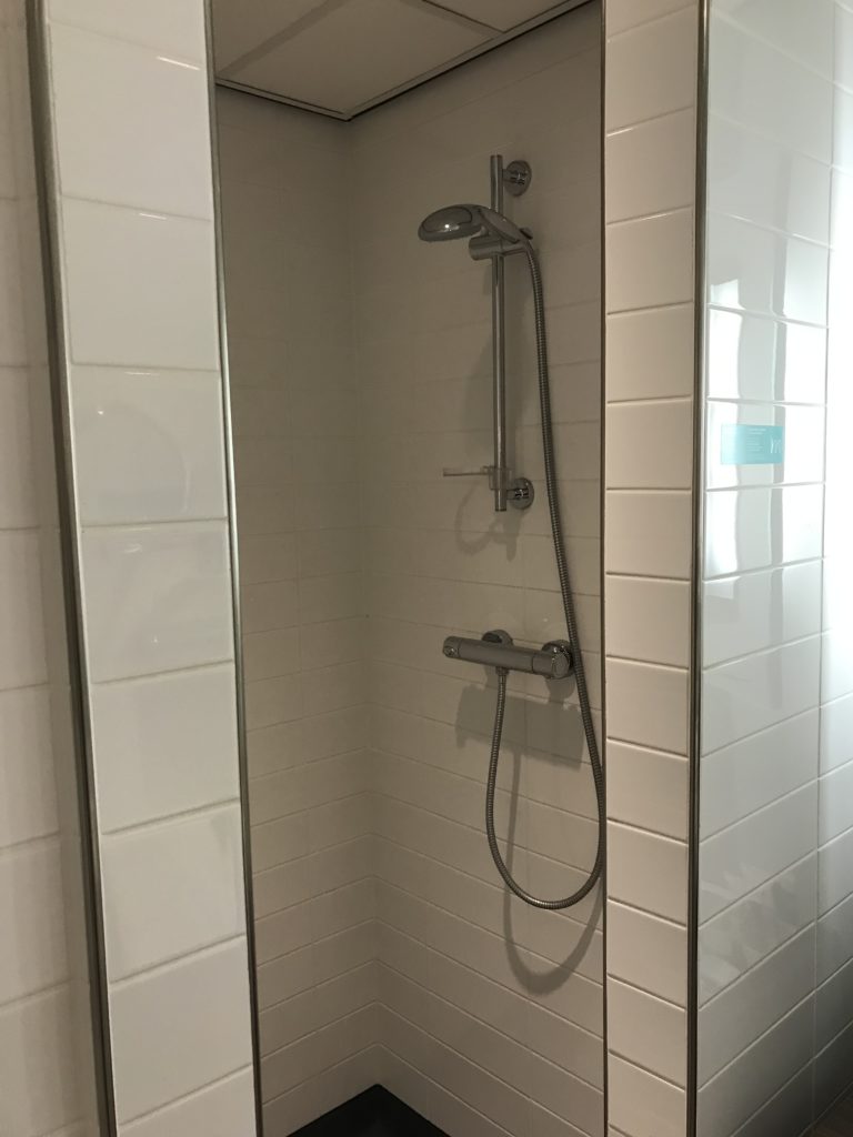 a shower with a shower head