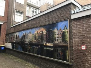 a painting on a brick wall