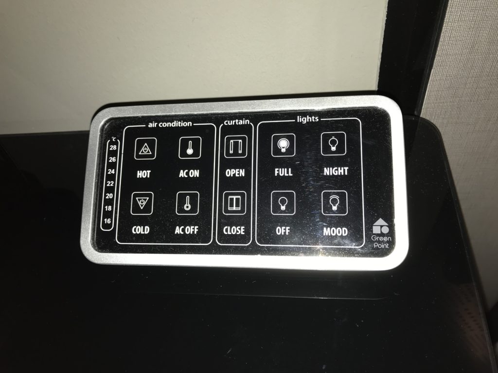 a black and white rectangular object with buttons