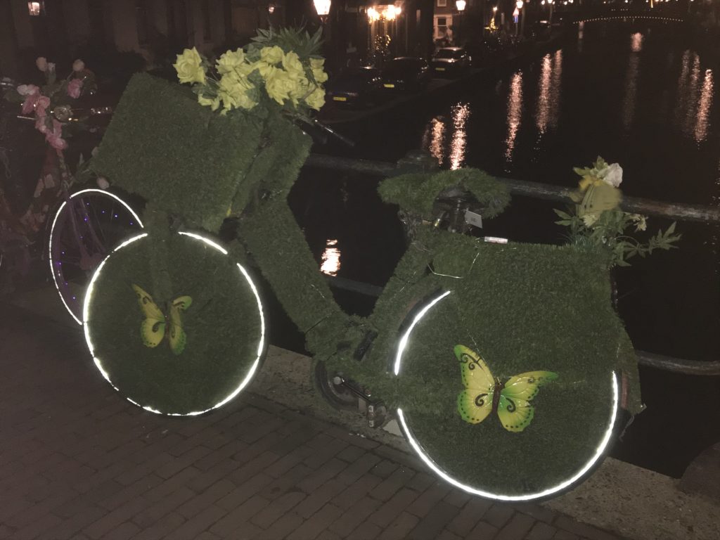 a bicycle decorated with flowers and butterflies