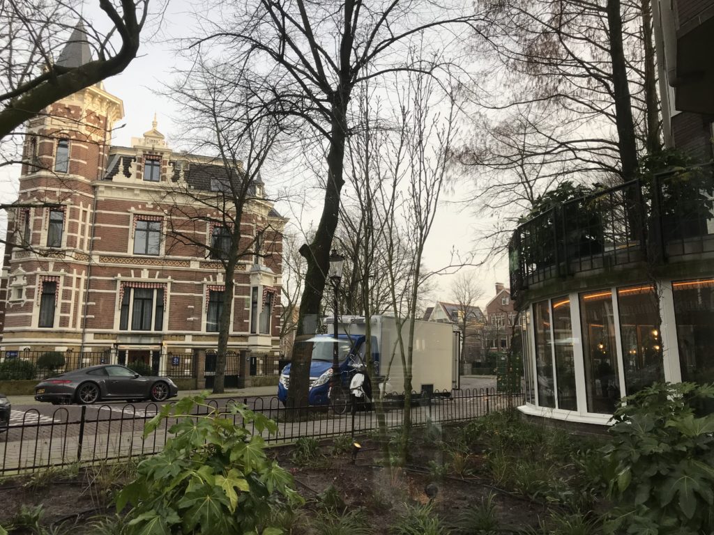 a building with trees and bushes